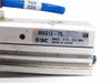 SMC MXS12-75 label plate showing model number, 0.15–0.7 MPa pressure rating, and Made in Japan marking