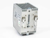 Sola SDN 10-24-100P – right-side and rear view showing DIN rail mounting clips and ventilated top