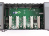 ICP DAS B884 backplane interior close-up showing green PCB with 8 module expansion slots, CE and RoHS markings, and Rev B.5 board revision label