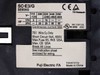 Fuji Electric SC-E3/G SE65AG rating label close-up — voltage/HP table, 100A continuous current rating, UL listing 253C, TUV Rheinland mark, Made in China