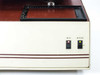 API UniScept Plus Autoreader – right-side front panel close-up showing RUN (red) and POWER (yellow) illuminated indicator toggle switches