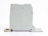 Auxel 38049 power distribution block — side profile view showing housing body and DIN rail mounting foot