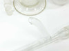 Close-up of two borosilicate glass burets with PTFE stopcocks featuring orange and blue handles
