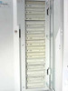 Meridian Data CD Net 314/M interior with door open showing 14 CD-ROM drives stacked vertically