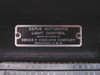 Oscar F. Carlson Company nameplate reading 'Depue Automatic Light Control Manufactured by Oscar F. Carlson Company Chicago U.S.A.'