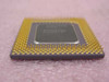 Intel BP80503166 SL23X 166MHz Socket 7 processor – angled side view showing gold SPGA pin array
