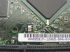 Dell 9591P motherboard close-up of PCB barcode label showing part number 0009591P-12465-9AA-014