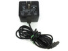 Hayes 52-00005 modem power supply — full view showing wall plug, cable, and 4-pin output connector with label reading 13.5VAC 700mA 9.5VA