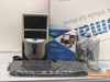 Systemax SYX-651M03 desktop PC tower shown with included accessories: keyboard, mouse, speakers, power cord, phone cord, and AOL System Resource Kit box