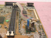 Compaq 381338-001 motherboard close-up showing ISA slots, Made in Taiwan label, and ribbon cable connector area
