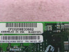 QLogic QLA2310FL PCB label close-up showing assembly number CFC0208E33662, model QLA2310FL, and IBM FRU 19K1273