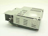 Sanken RH3-2182 OEM power supply – angled front and side view showing metal enclosure with ventilation slots and label