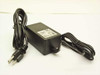 Welch Allyn PS5/C AC adapter front view showing black housing, attached AC power cord with NEMA plug, and output cable