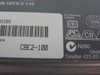 Xircom CBE2-100 rear label showing model CBE2-100, barcode, PC Card and CB certifications, Canadian ICES-003
