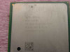 Intel Pentium 4 SL66R CPU top label showing 2.0GHz/512/400/1.5V specs and Costa Rica origin mark