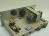 Marsh-McBirney Model 500 internal view with top cover removed — two transformers, circuit board assembly, wiring harness, and component layout visible
