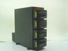 Megadrive EV-200 RAID Ultra SCSI 4-bay tower enclosure — front and right side view showing empty drive bays with yellow labels