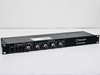 Black Box MX330A-C 3174/3274 I-Mux — front-left three-quarter view showing 1U rackmount chassis, fiber optic link section, copper BNC port, and four controller BNC ports