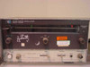 HP 8620B Sweep Oscillator front panel close-up showing band selector, sweep controls, frequency range scale, and calibration sticker