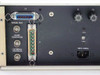 UTI 100C rear panel close-up showing J1 and J2 D-Sub connectors, BNC Signal Out, Ramp Generator, External Program, 115V/230V selector, F1/F2 fuse holders, and IEC AC inlet