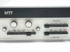 UTI Instruments Model 100C front panel close-up showing UTI Instruments logo, Scan Width and Scan Center controls, and Program/Function button rows with labels