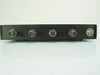 Black Box Multiport Repeater 1050 LE1050A-BNC rear panel straight-on view showing four BNC coax ports and circular DIN connector