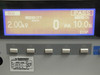 Kikusui TOS9201 rear panel detail showing SCANNER port, SIGNAL I/O connector, GPIB interface, INTERLOCK terminals, STATUS OUT terminals, dual cooling fans, IEC AC inlet with line voltage range switch (100-120V / 200-240V), and ground terminal