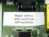 Close-up of APC AP9211 board label showing Model AP9211, AOS firmware aos303.bin, and APP firmware ms220.bin