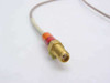 Times Microwave coaxial cable SMA Female connector end close-up showing gold-plated brass body and color-banded strain relief