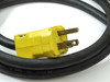 Close-up of included 12 AWG 3/C Type SJ power cable with yellow NEMA plug
