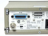 HP 37203A HP-IB Extender rear panel close-up — HP-IB 24-pin IEEE-488 connector, COAX BNC, Master/Slave selector, fuse and power ratings label (Made in Great Britain), Option 001 label