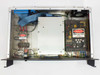 Varian VJW2740-10-1 interior view with cover removed showing internal PCBs, power supply section with DANGER HIGH VOLTAGE labels, blue ribbon cable, and wiring harness