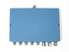 Merrimac PDM-81M-3.95G power divider – bottom view showing 8 SMA output connectors and smooth blue aluminum housing