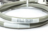 Close-up of CEC cable label reading 'CEC 1 METER 01000-90001' affixed to gray cable jacket