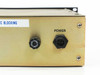 Rear panel power section of MC-1200-2X32-F/B-UG showing rotary fuse holder and 3-pin locking power connector