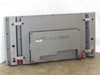 Dell W3000 30-inch LCD TV — rear view showing back panel, VESA mounting points, integrated speaker enclosures, and red speaker wiring