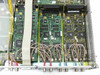 Pegasus XT interior detail showing interface board with multiple ICs, ribbon cable connections, and yellow signal wiring