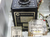 Interior detail showing analog timer dial (0-10), relay components, and transformer with 120V 60Hz label