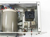 Interior transformer label showing Vol 120, 60Hz, date code markings, and wiring harness