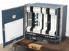 Cisco ONS 15454 shelf with front door open, revealing full complement of installed line cards and TCC modules