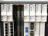 Closeup of left card section showing E100T (slots 1–2), OC3, OC3IR (STM1SH IR), TCC+, and XCVT cards with FAIL/ACT/SF LEDs