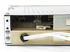 P.R. Hughes GT32A-6A – rear left-side detail showing bent/damaged chassis frame with white cable connector and internal components visible