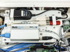 Americom AST3100 interior close-up showing Multi-Tech MultiAccess Communications Server module with USB hub and cabling installed inside the chassis
