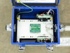 Kurz K-BAR 2000B enclosure interior — top-down view of electronics bay with green interface PCB centered, terminal block arrays, multicolored wiring, and probe connection port on right side