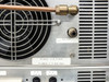 Fritz Hüttinger TIS 2.5/13560 – cooling detail showing large fan, copper water pipe, coolant fittings labeled ABLAUF, Q min 6 l/min, P Nenn 7 bar/max, and fuse positions F2 1.0A and F3
