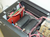 Eratron PPS 8210 – interior close-up showing dual-winding power transformer wrapped in insulation, red wiring, and control board assembly