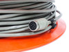 Close-up of 5-pin female circular connector end of gray data extension cable on orange spool