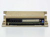 Headway Research 800-404A PWM32 Motor Module — straight-on rear edge view showing 4-pin motor power connector, white 16-pin ribbon connector, and PCB edge visible inside housing