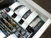 Epro 142AX interior detail – power supply module, cooling fan, and additional test board cards with ribbon cable harnesses