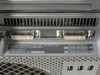Apple Mac Pro A1186 rear panel label showing Model A1186 EMC 2113, serial number, MAC address, power spec 100-240V 50-60Hz, and two DVI ports from ATI X1900XT